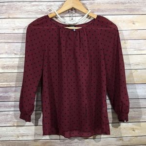 J. Crew polka dot chiffon top.